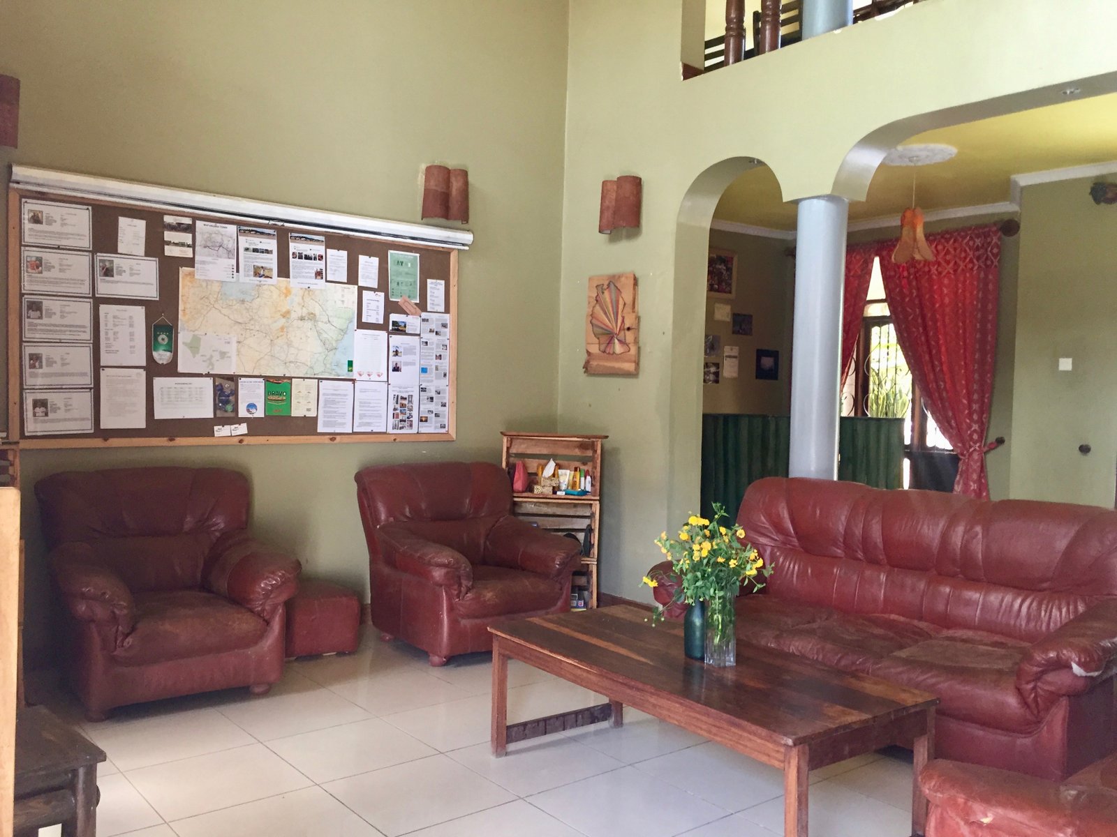 Common room lounge with leather furniture at the lodge